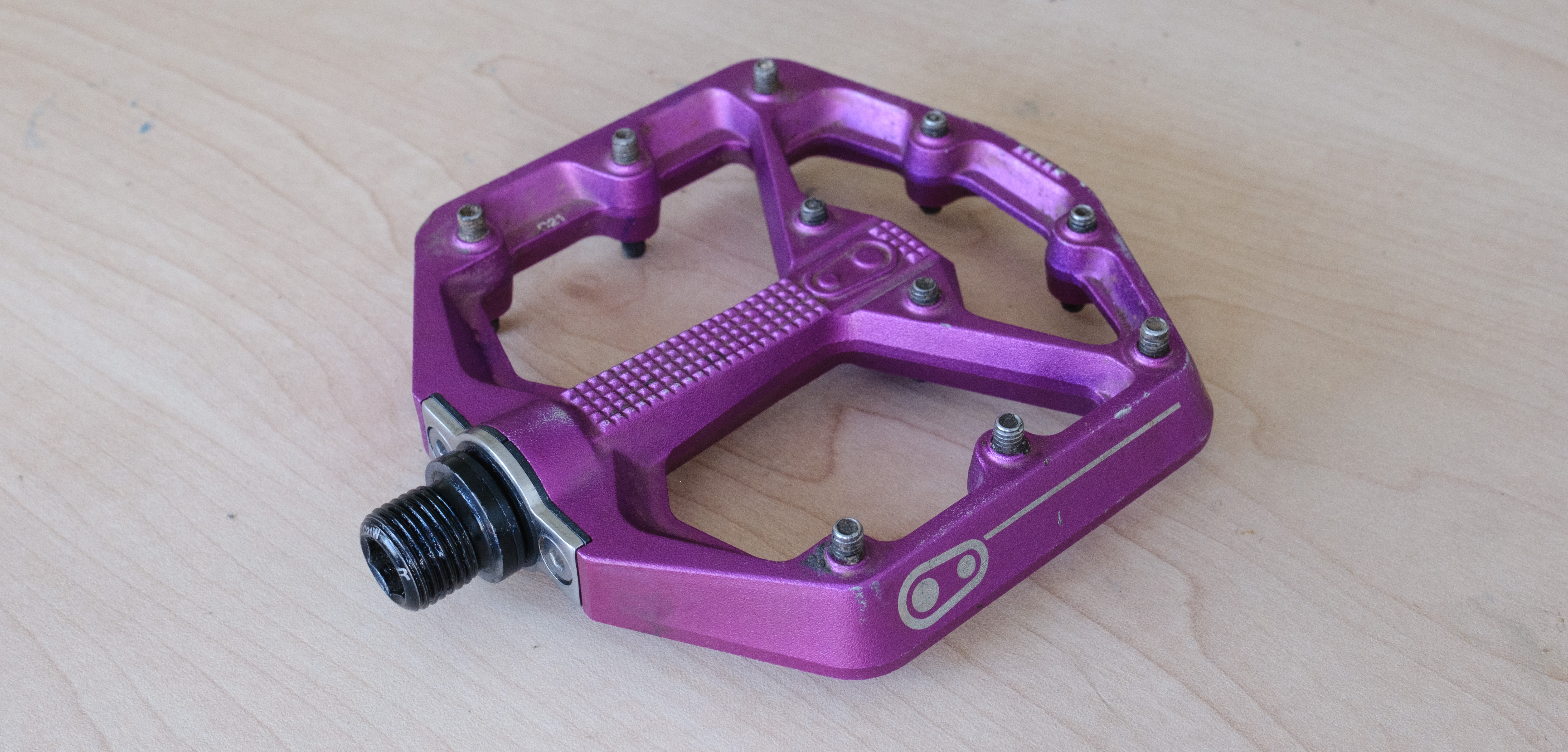 A Stamp 7 pedal facing towards the pedal threads with a cleaned up bearing retainer