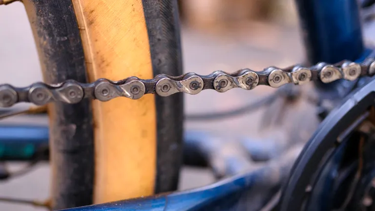 A 9-speed chain with caked on grime.