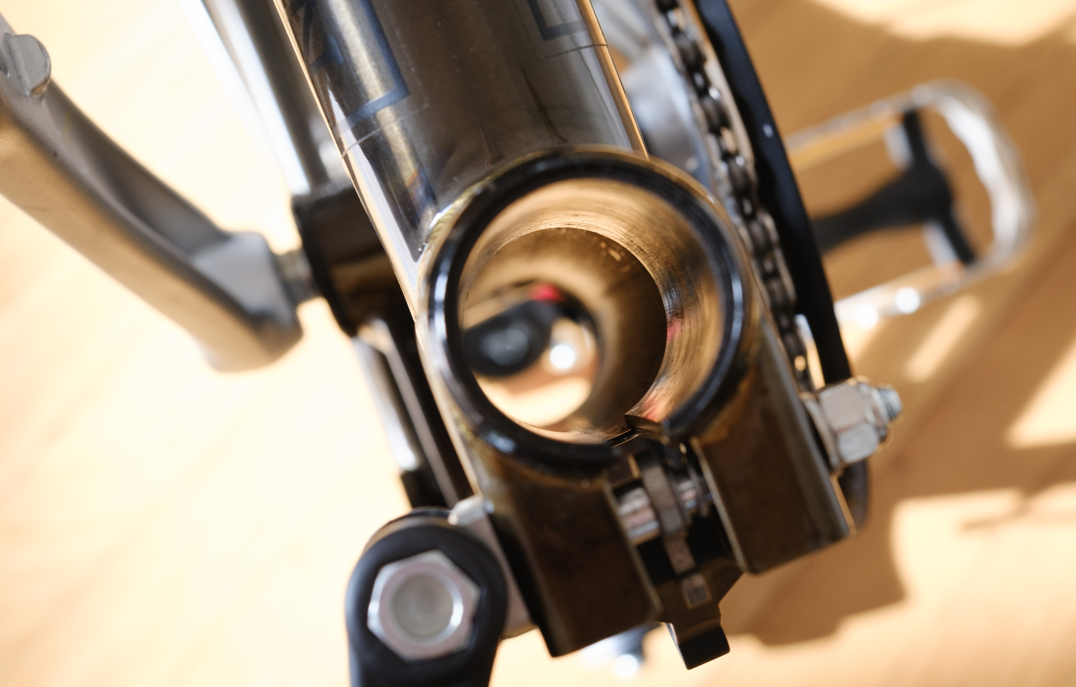 Looking inside the seat tube of a Brompton with the seat sleeve visible.