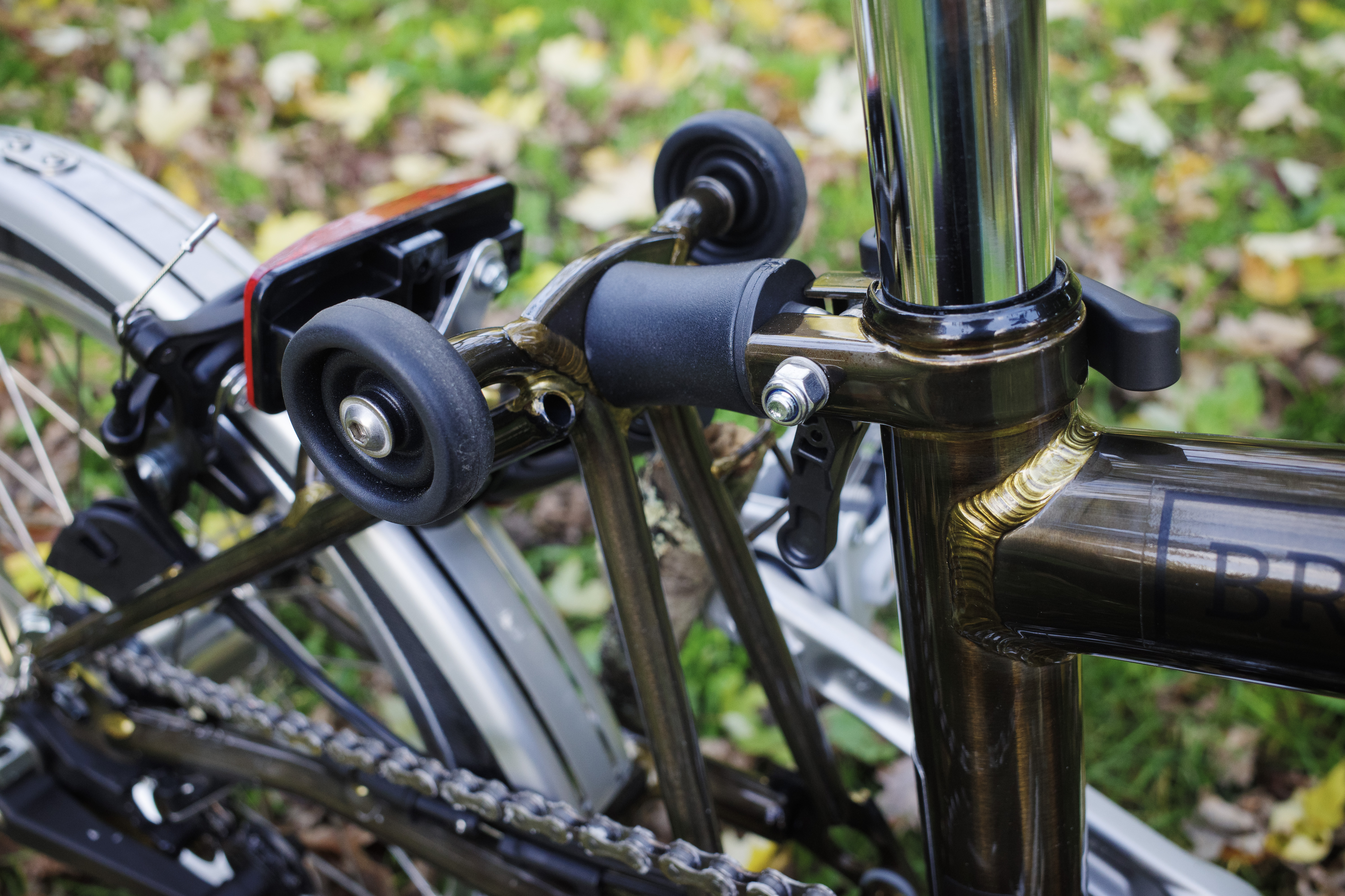 The rubber bumper between the rear triangle hinge and seat tube.