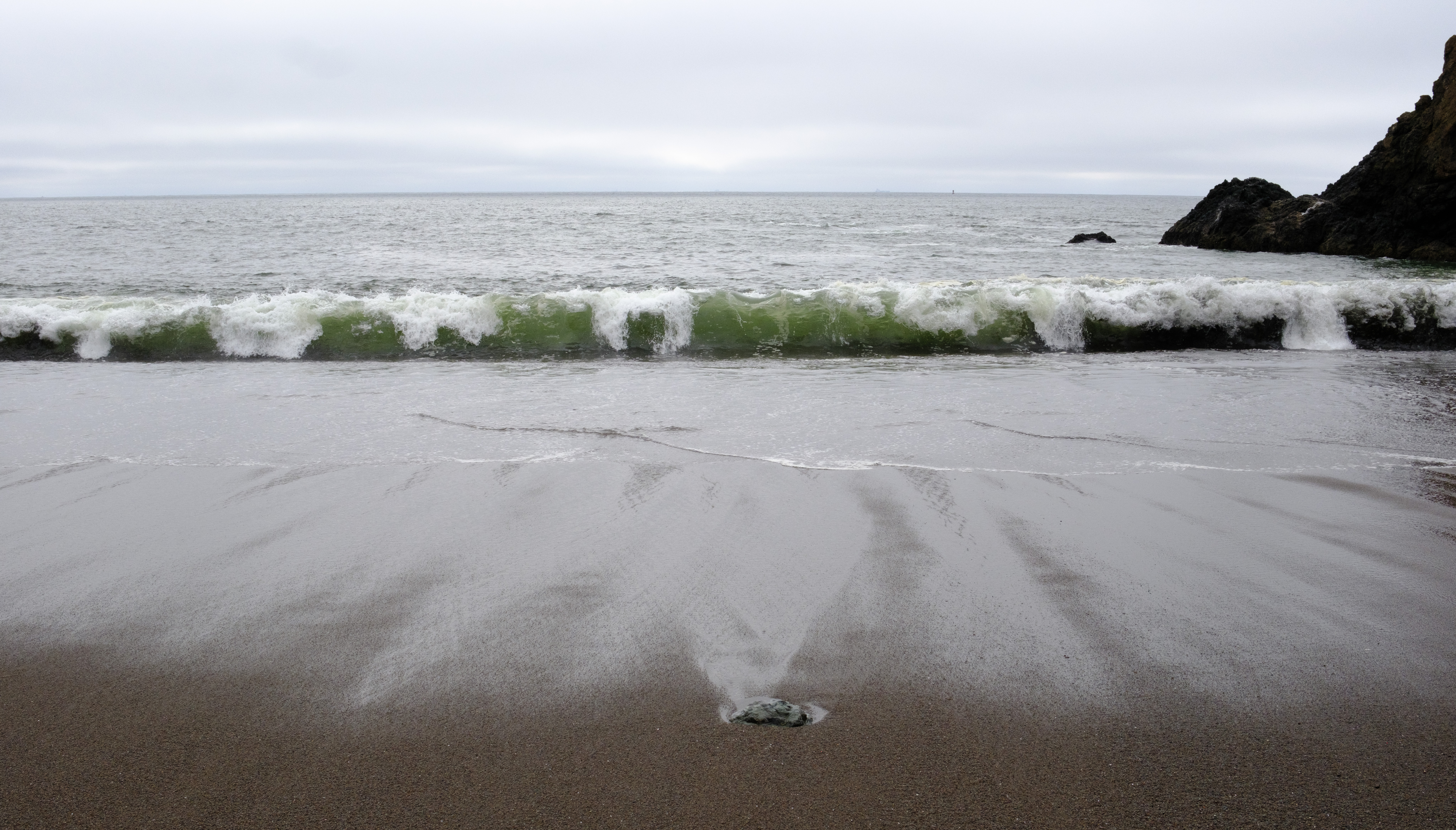 A wave coming into the shore at Tennessee Valley Beach