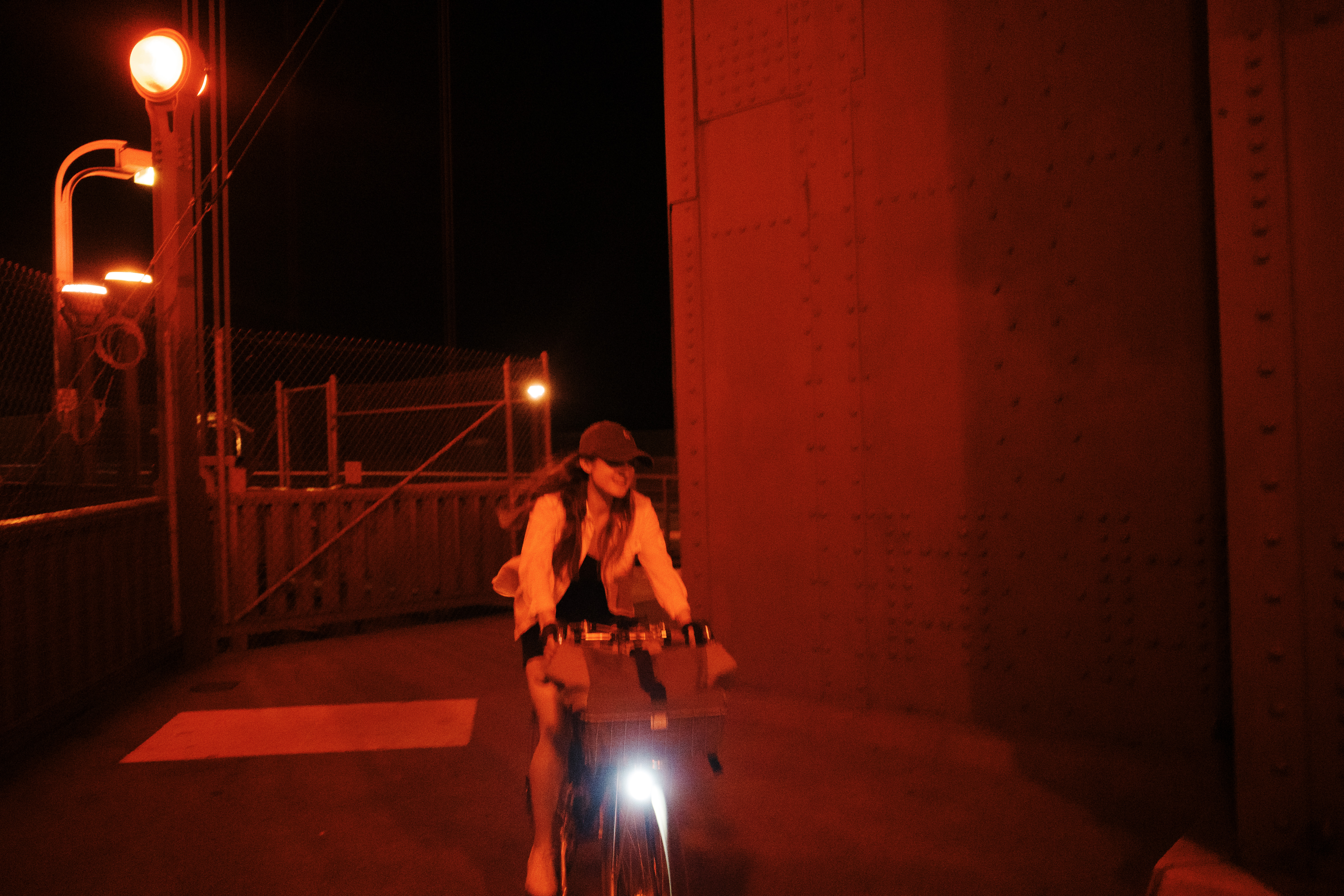 Kat riding around the bend on one of the Golden Gate Bridge towers
