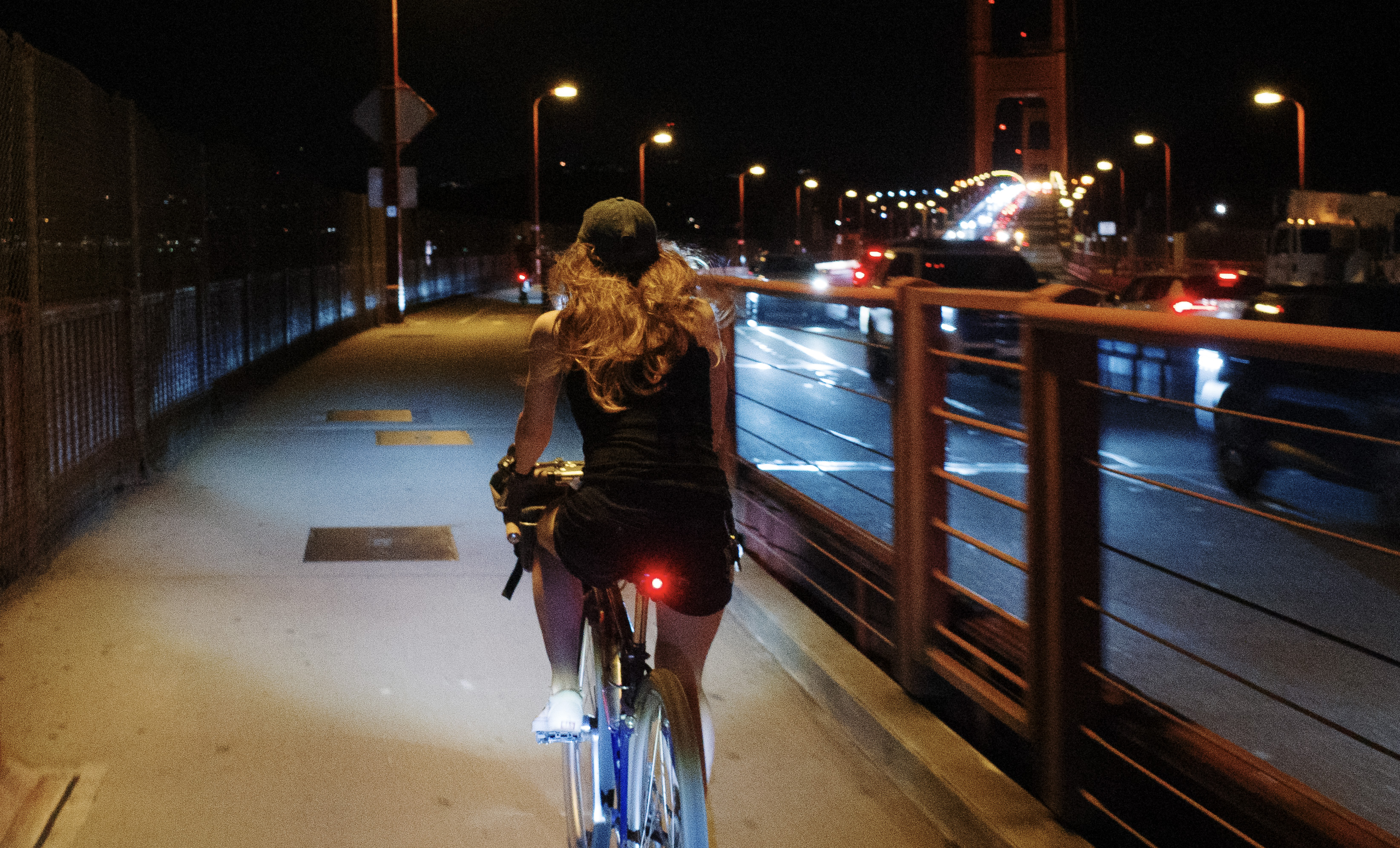 Kat riding back on the east sidewalk of the Golden Gate Bridge